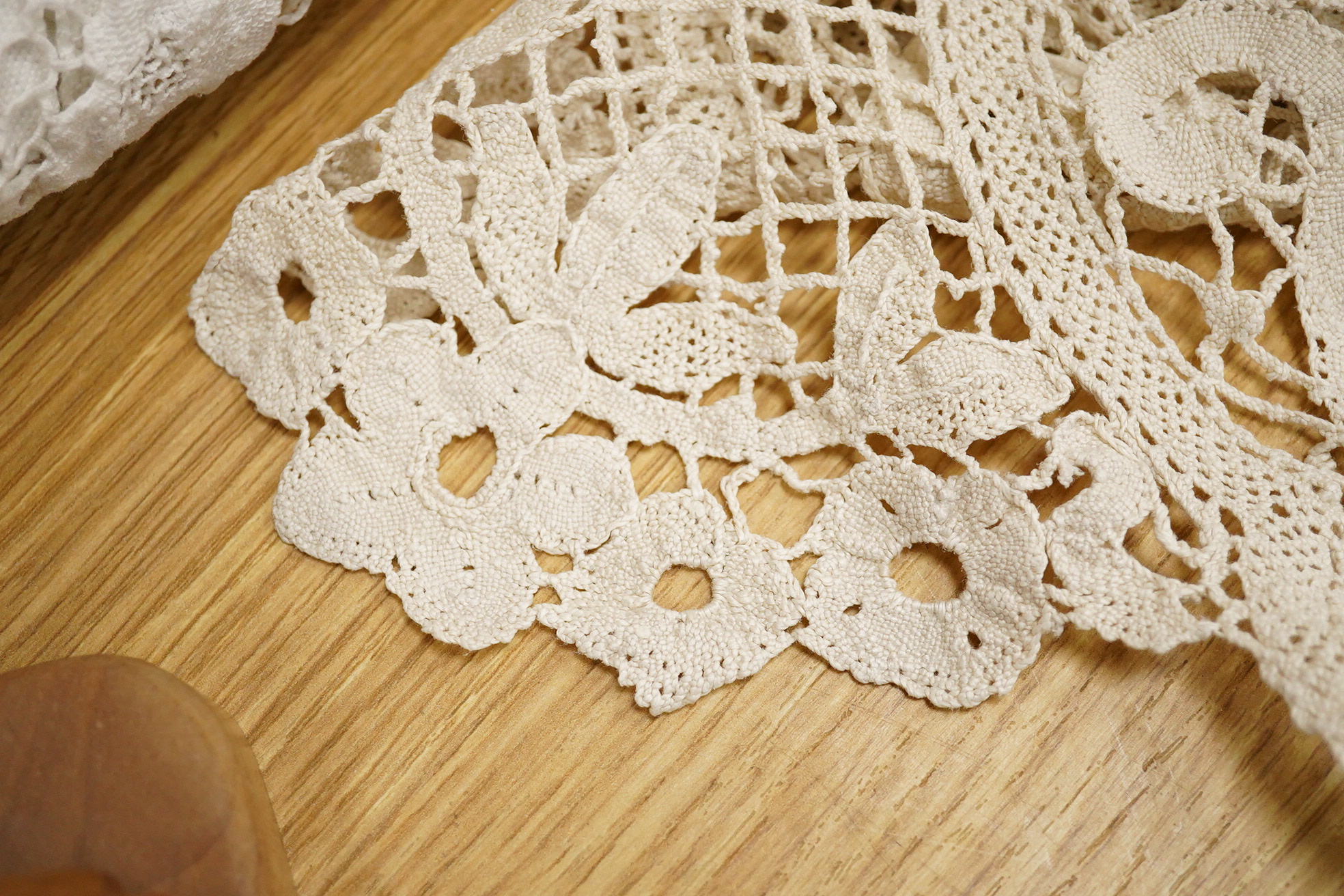 Two ornately designed tape lace bed covers, white cover 152cm x 236cm, beige cover 176cm x 364cm